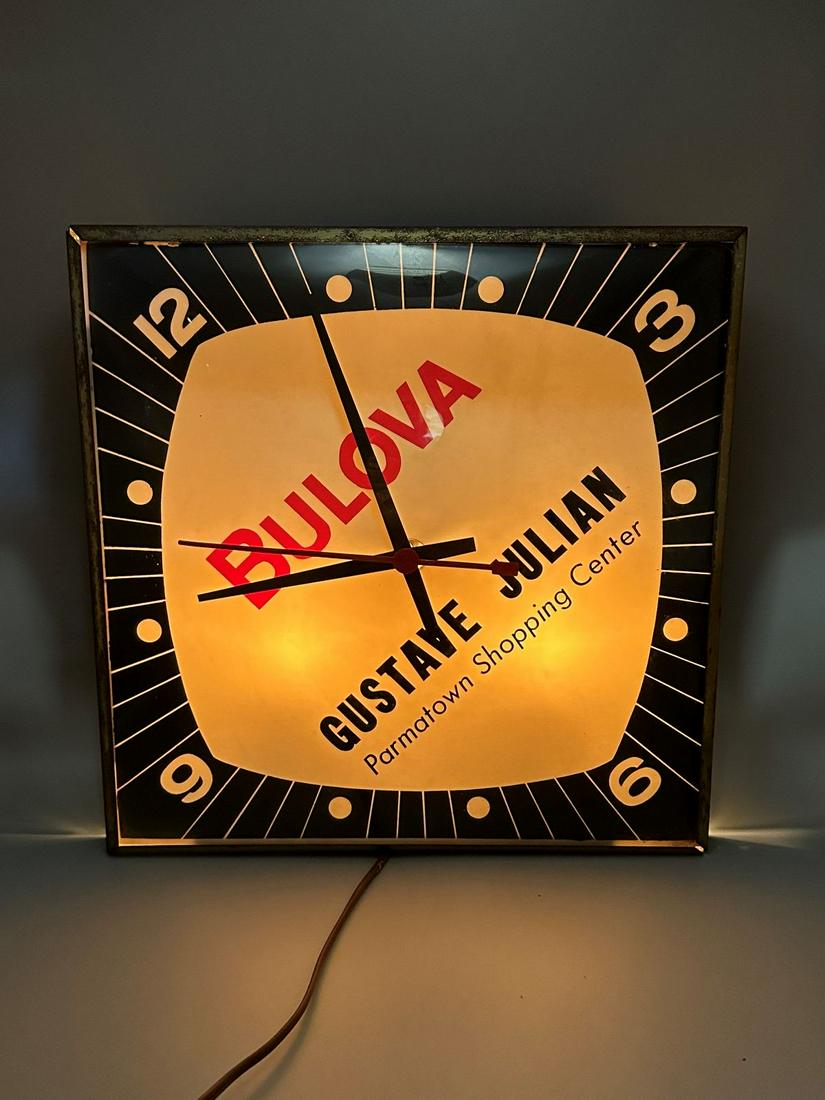 Bulova Watches Advertising Gustave Julian Light Up Clock: Bulova Watches Advertising Gustave Julian Light Up Clock: Advertising for Gustave Julian Parmatown Shopping Center. Square bubble glass with no condition issues. Metal housing has rusting. In working