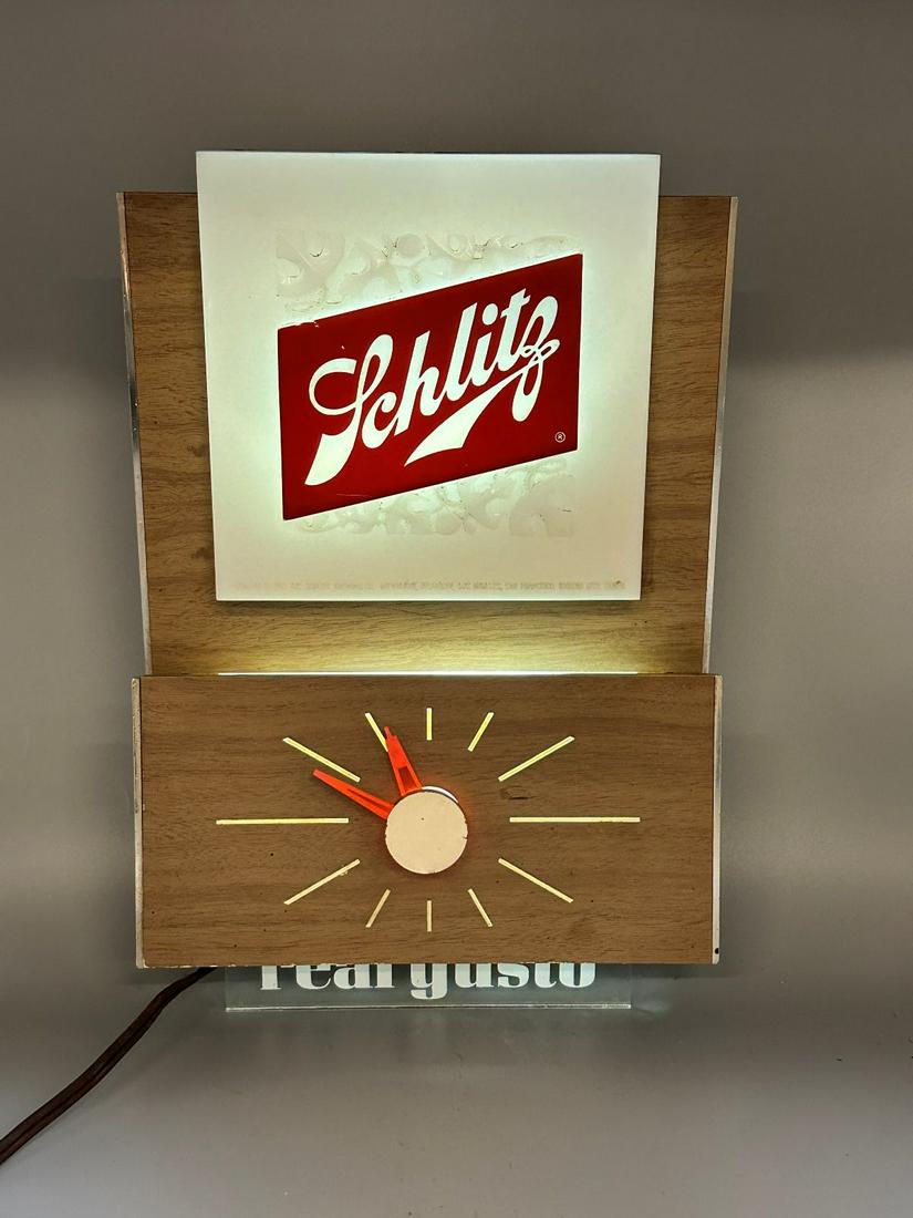 Schlitz Beer Advertising Light Up Sign and Clock: Schlitz Beer Advertising Light Up Sign and Clock: "Real Gusto" lucite bottom sign. in working condition. Orange hands. Measures 11.25" tall, 7.5" wide, 3.75" deep. This item requires third party shipp