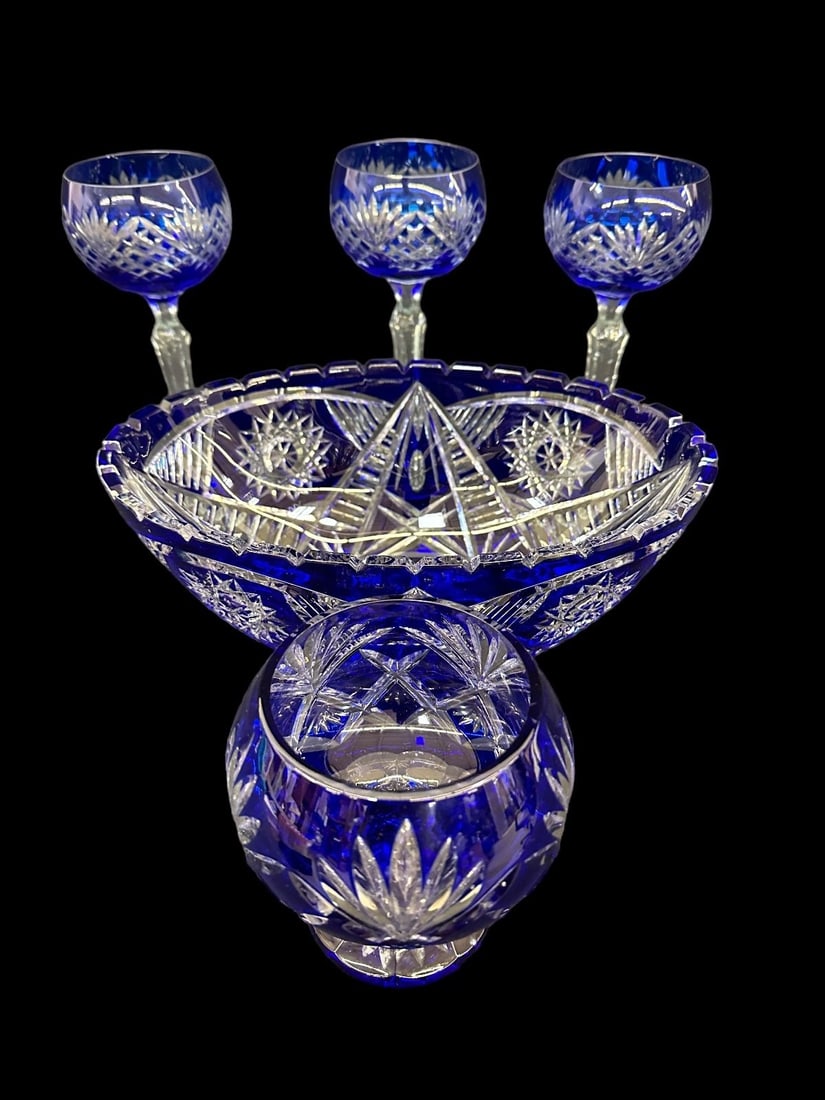 Group of Cobalt Cut to Clear Glassware: Group of Cobalt Cut to Clear Glassware: Oval bowl 11.75 x 7.75", caviar server 5" tall, (3) wine glasses 8.5" tall. No condition issues.