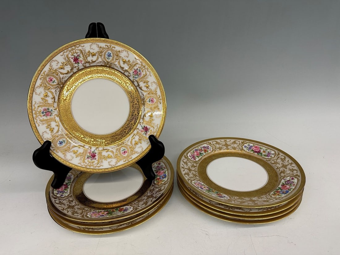 (8) Limoges France Depose C. Ahrenfeldt Plates: (8) Limoges France Depose C. Ahrenfeldt Plates: Heavy gold gilt measuring 8.5" diameter. No condition issues