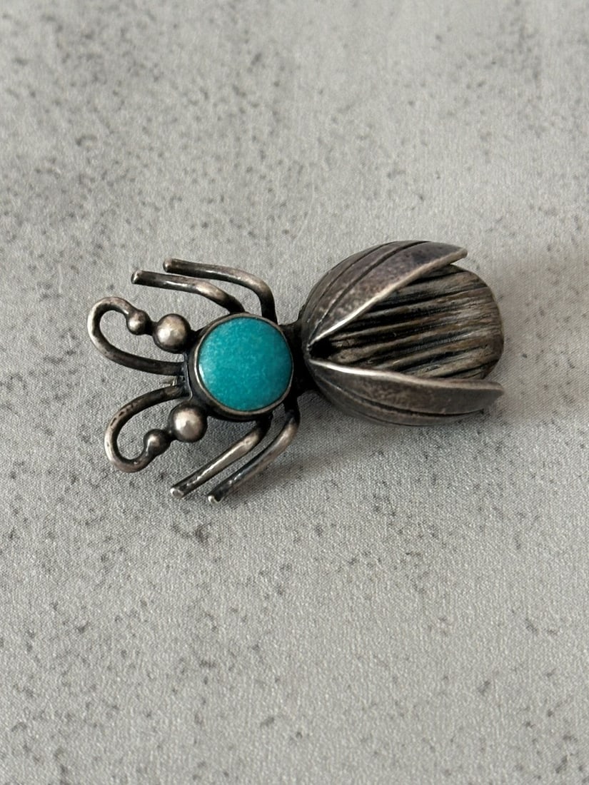 Sterling Silver Figural Beetle Brooch: Sterling Silver Figural Beetle Brooch: Measures 1.5" long with round turquoise cabochon on top half.