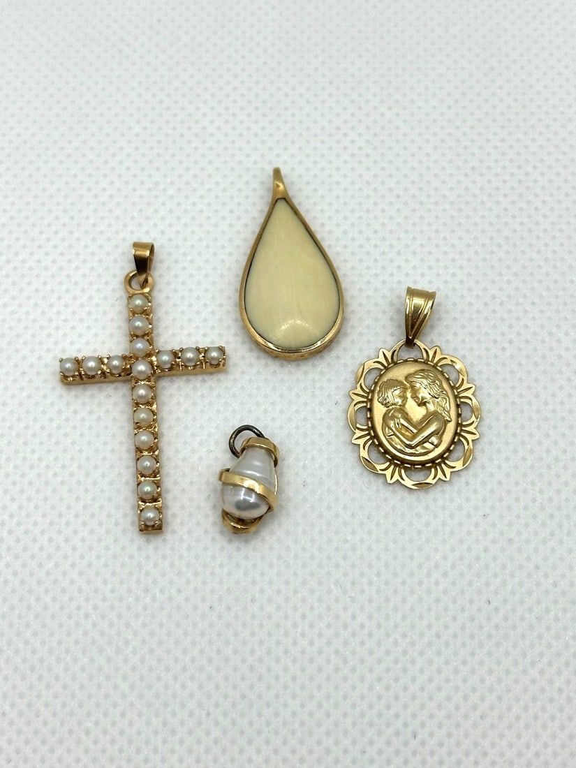 (4) 14k Gold Pendants: (4) 14k Gold Pendants: Includes cross with seed pearls, drop tear with bone, mother and daughter pendant, baroque wrapped pearl. Weight is 8.8 grams