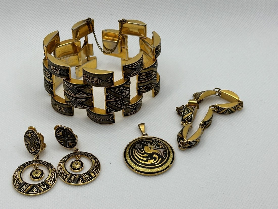 Group of Gold Tone Damascene Jewelry: Group of Gold Tone Damascene Jewelry: Chunky wide bracelet, thin bracelet, pendant, pair earrings.