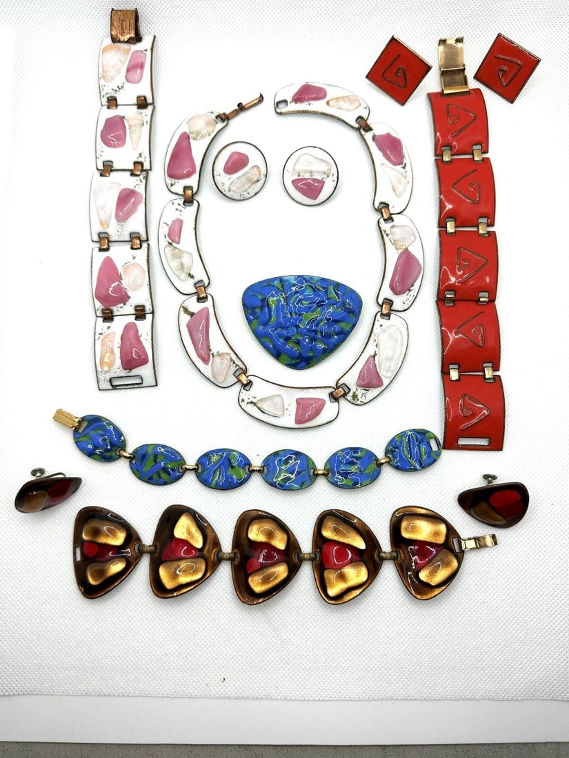 K. Denning Enamel Jewelry Group: K. Denning Enamel Jewelry Group: Includes 4 different sets. Orange bracelet and earrings, blue bracelet and brooch, white/pink necklace, earrings and bracelet, brown/red earrings and bracelet.