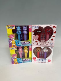 (4) Care Bears and Happy Valentine's Day Pez Collector Sets