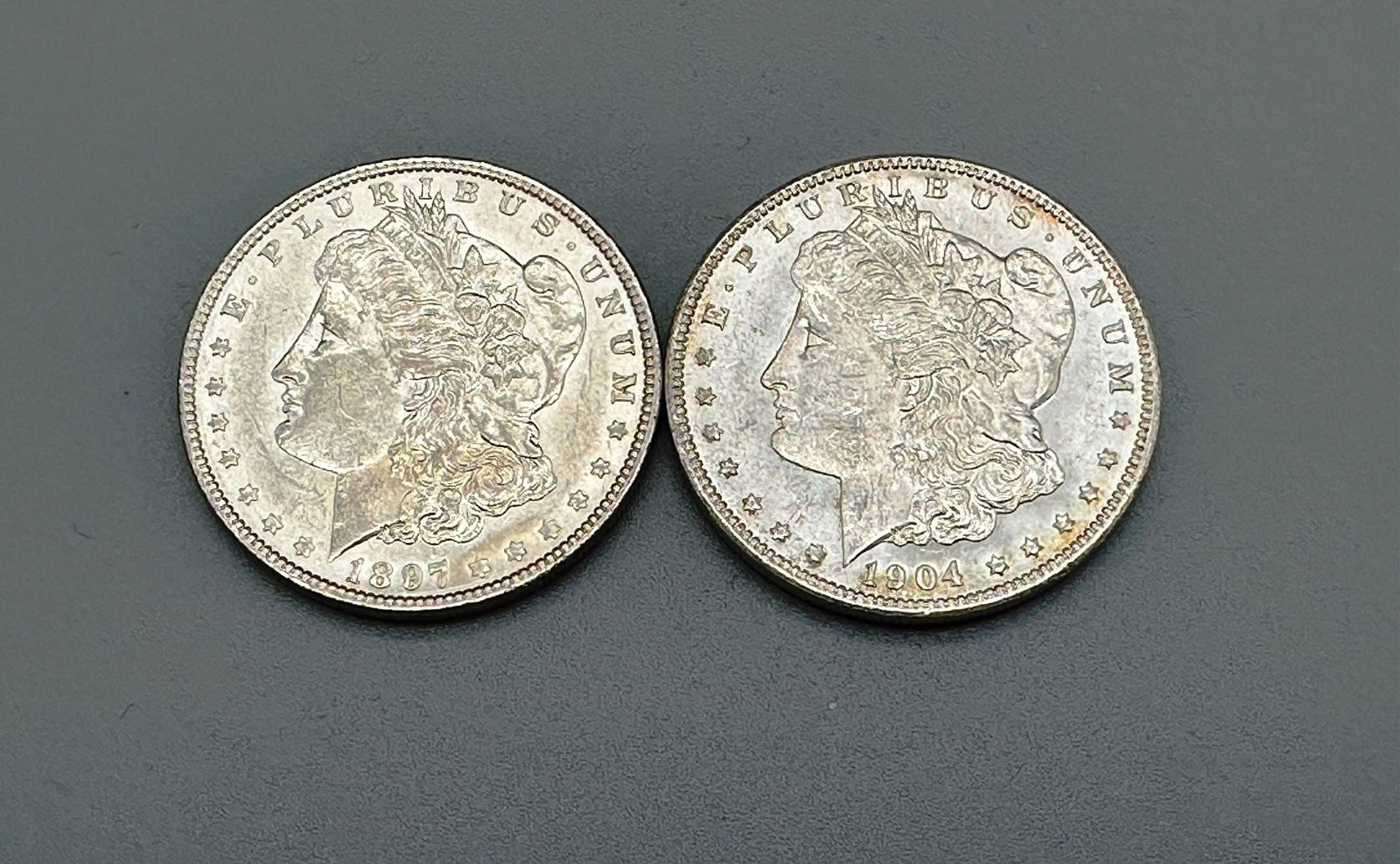 (2) Morgan Silver Dollars 1897-P and 1904-O (1 of 2)