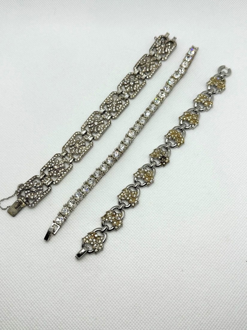(3) Sterling Silver Bracelets with CZ's: (3) Sterling Silver Bracelets with CZ's: Single round row 7", leaf shape motif with gold wash back 7.25", fancy with floral center 7".