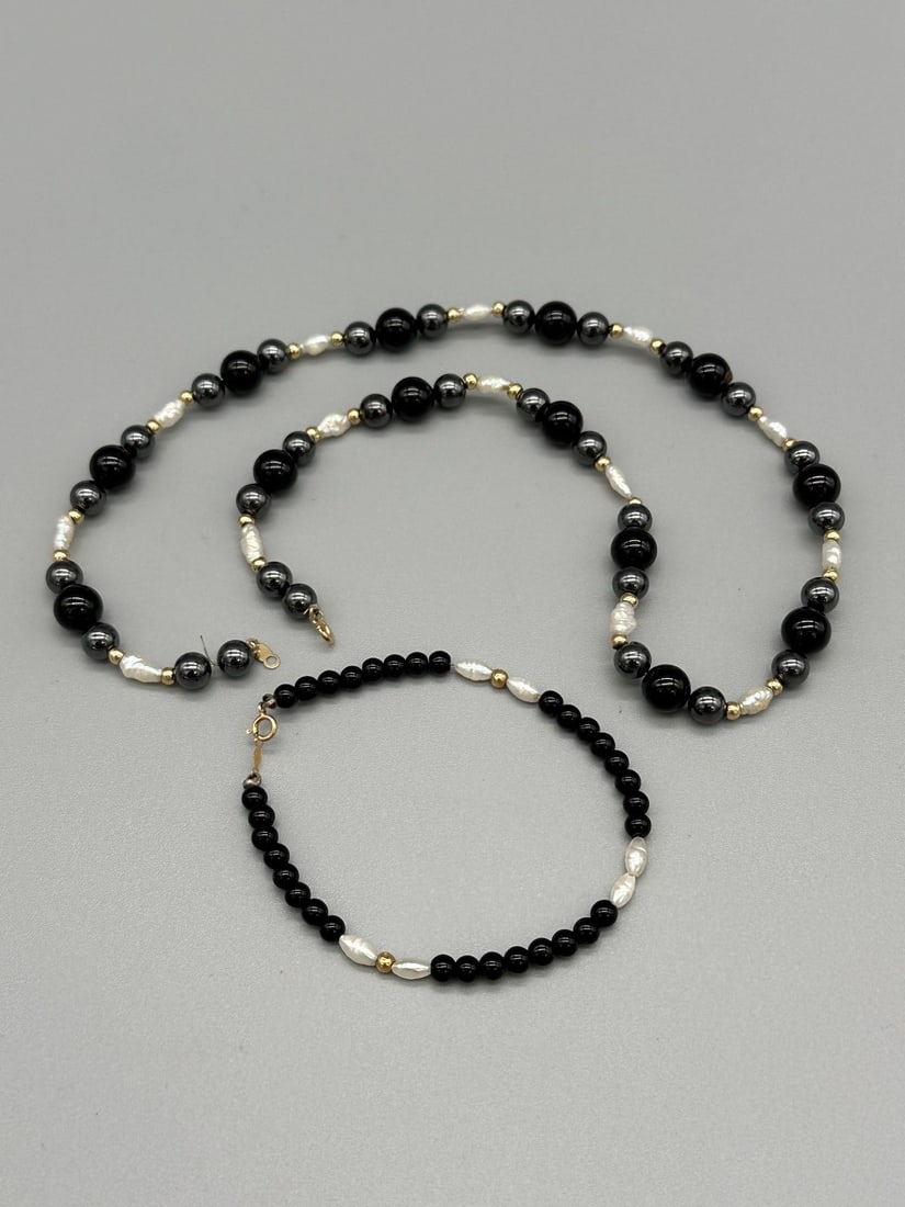 14k Gold and Onyx Pearls Necklace and Bracelet: 14k Gold and Onyx Pearls Necklace and Bracelet: Necklace is 17" long, black onyx with 14k gold ball spacers throughout.