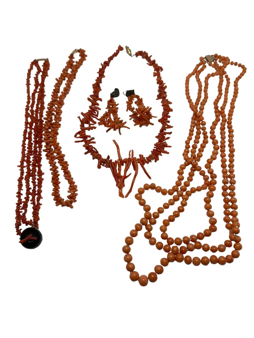 (4) Victorian Coral Necklaces and Earrings: (4) Victorian Coral Necklaces and Earrings: 2 are multi strand, one is necklace and earring set. 17" double strand drop onyx pendant. 16" tube strand. 17" graduated length coral with earrings. 24" 3 s