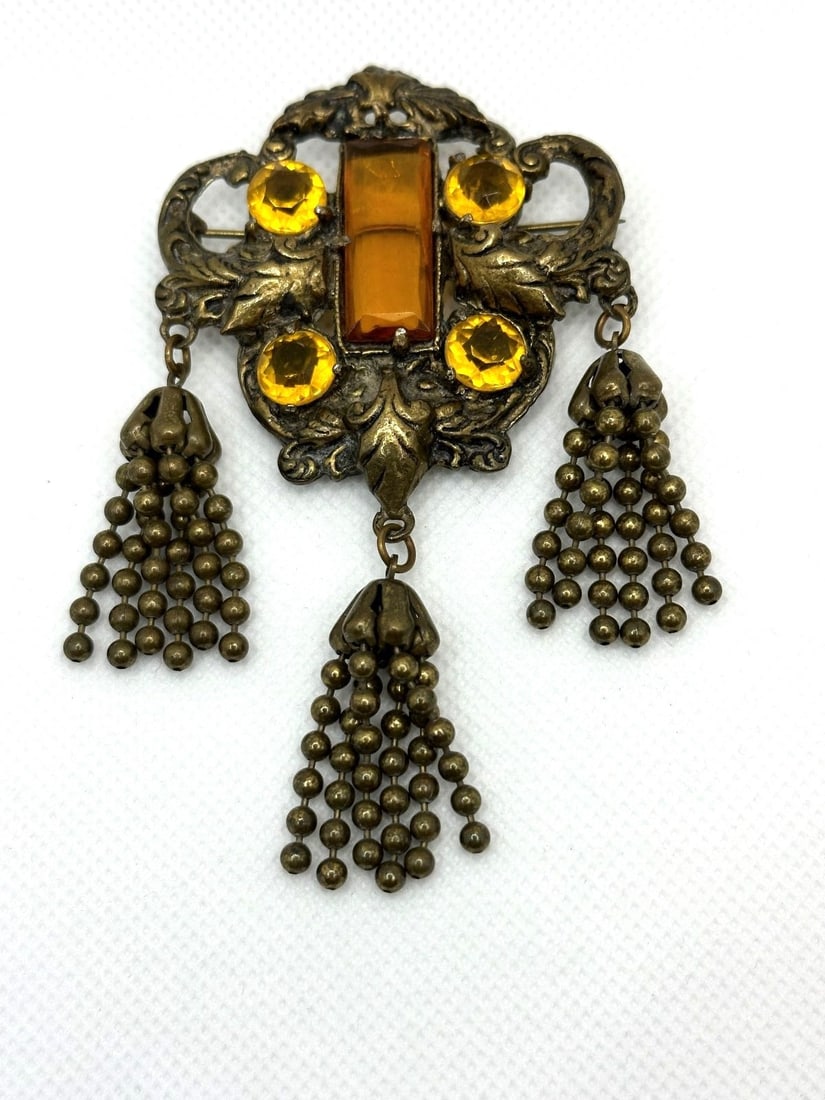 Victorian Brass Sash Brooch: Victorian Brass Sash Brooch: Lovely brooch with 3 dangle fringe drops, and center citrine colored stones. 4" long.