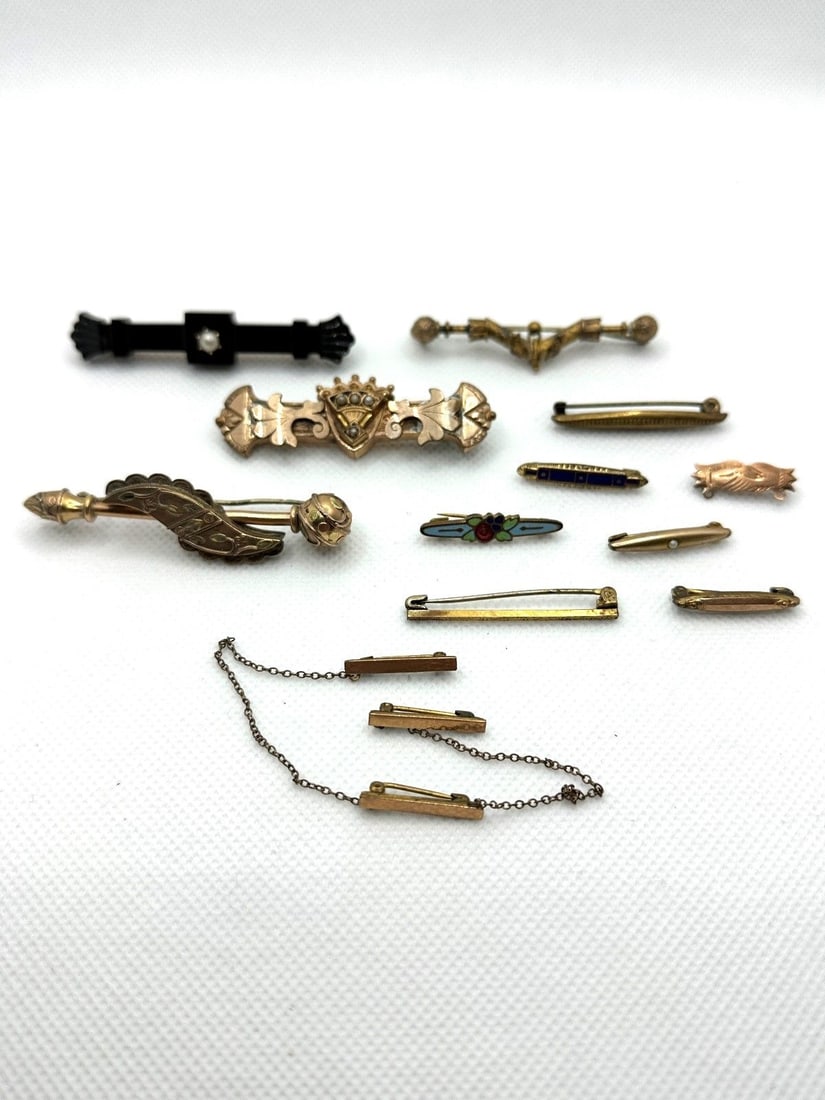 (12) Victorian Gold Filled Bar Brooches: (12) Victorian Gold Filled Bar Brooches: vulcanite with pearl, seed pearls, enameled, and others