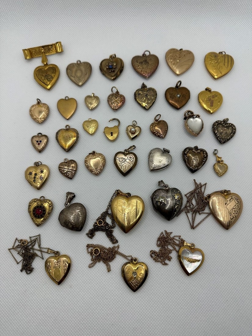 Large Group of Victorian Gold Filled Hearts, and Necklaces: Large Group of Victorian Gold Filled Hearts, and Necklaces: Includes sterling silver, most from Victorian age, one from 1893 Chicago. 36 in all and most are lockets.