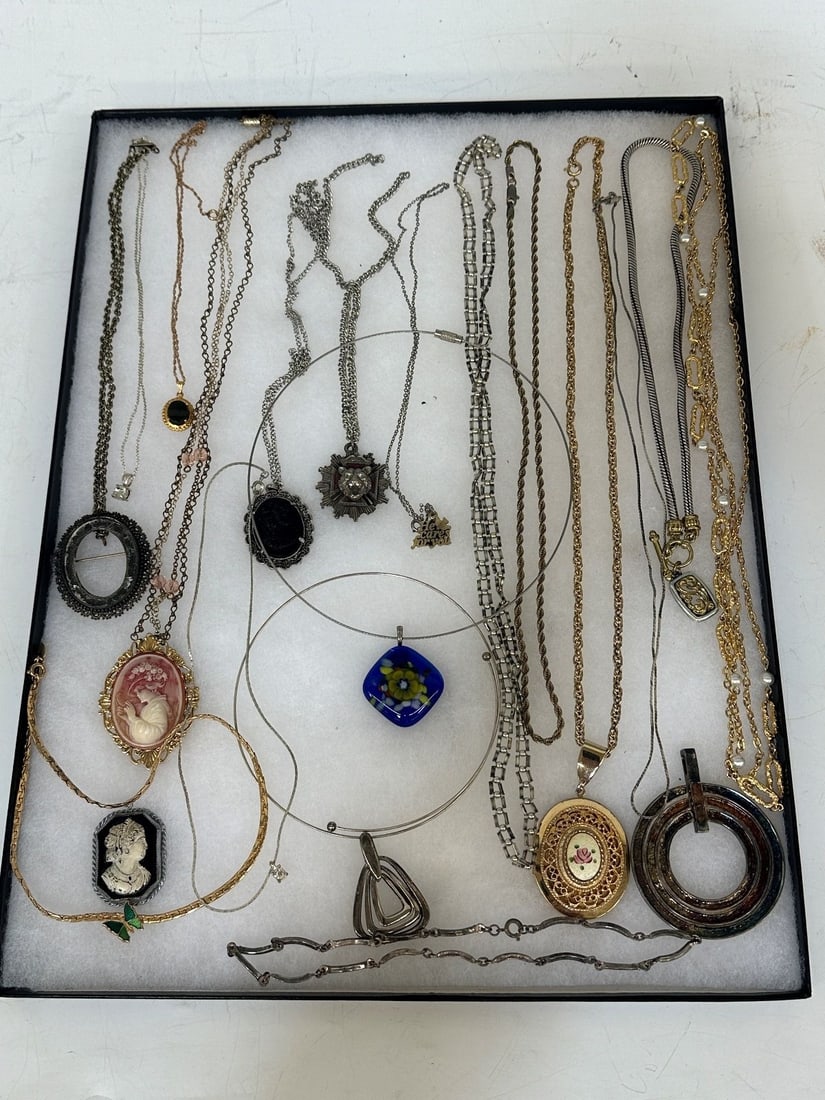 Group of 17 Costume Art Glass Necklaces: Group of 17 Costume Art Glass Necklaces: some with cameos and most with glass pendants.