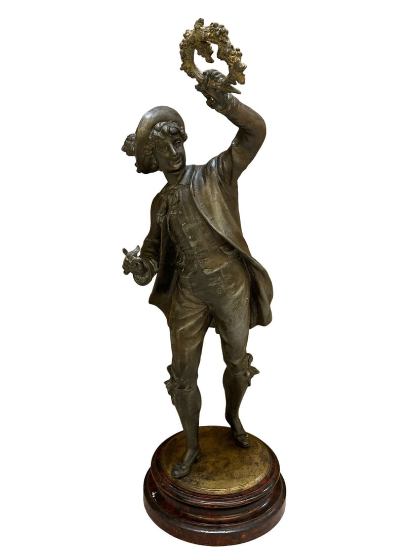 Metal Casting Man With Wreath Figural Sculpture: Metal Casting Man With Wreath Figural Sculpture: 19.75" tall, 6" diameter plinth.