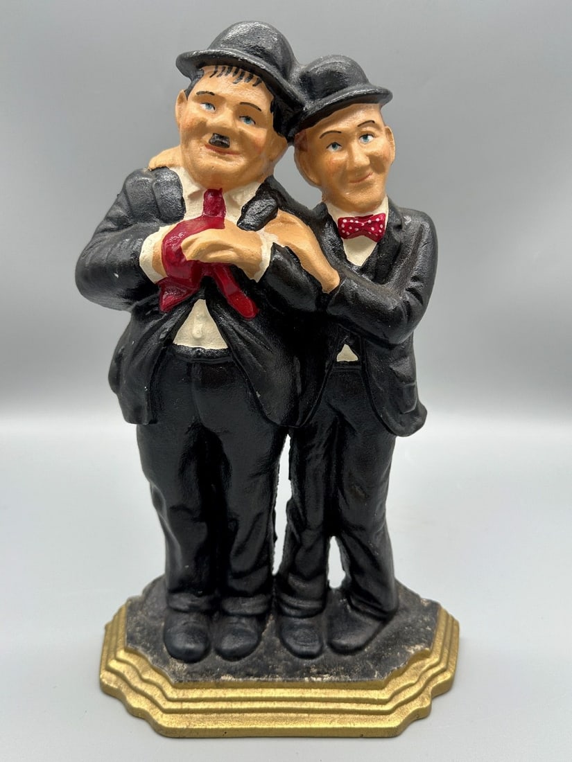 Laurel and Hardy Cast Iron Door Stop: Laurel and Hardy Cast Iron Door Stop: Measuring 11" tall.