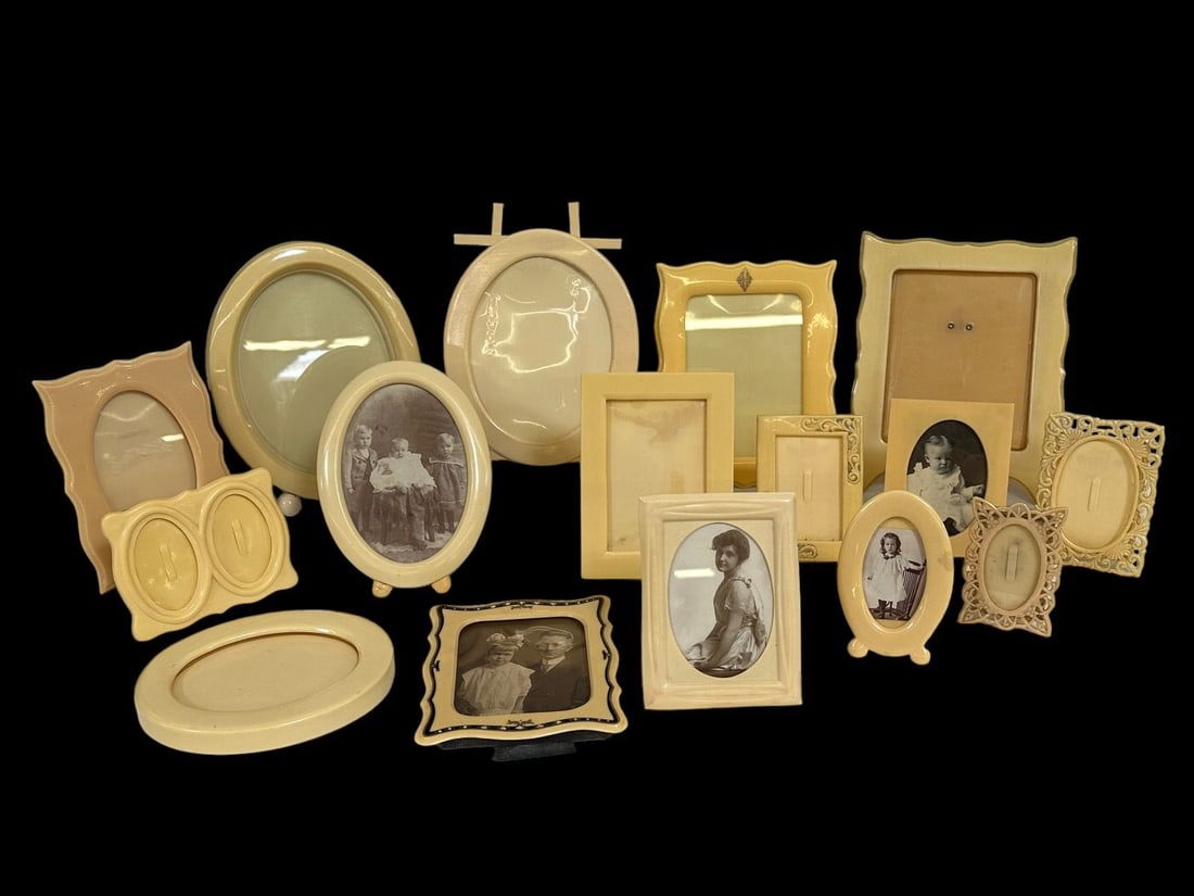 (16) Celluloid Picture Frames: (16) Celluloid Picture Frames: large to small, some reticulated and art deco. Tallest measures 9".