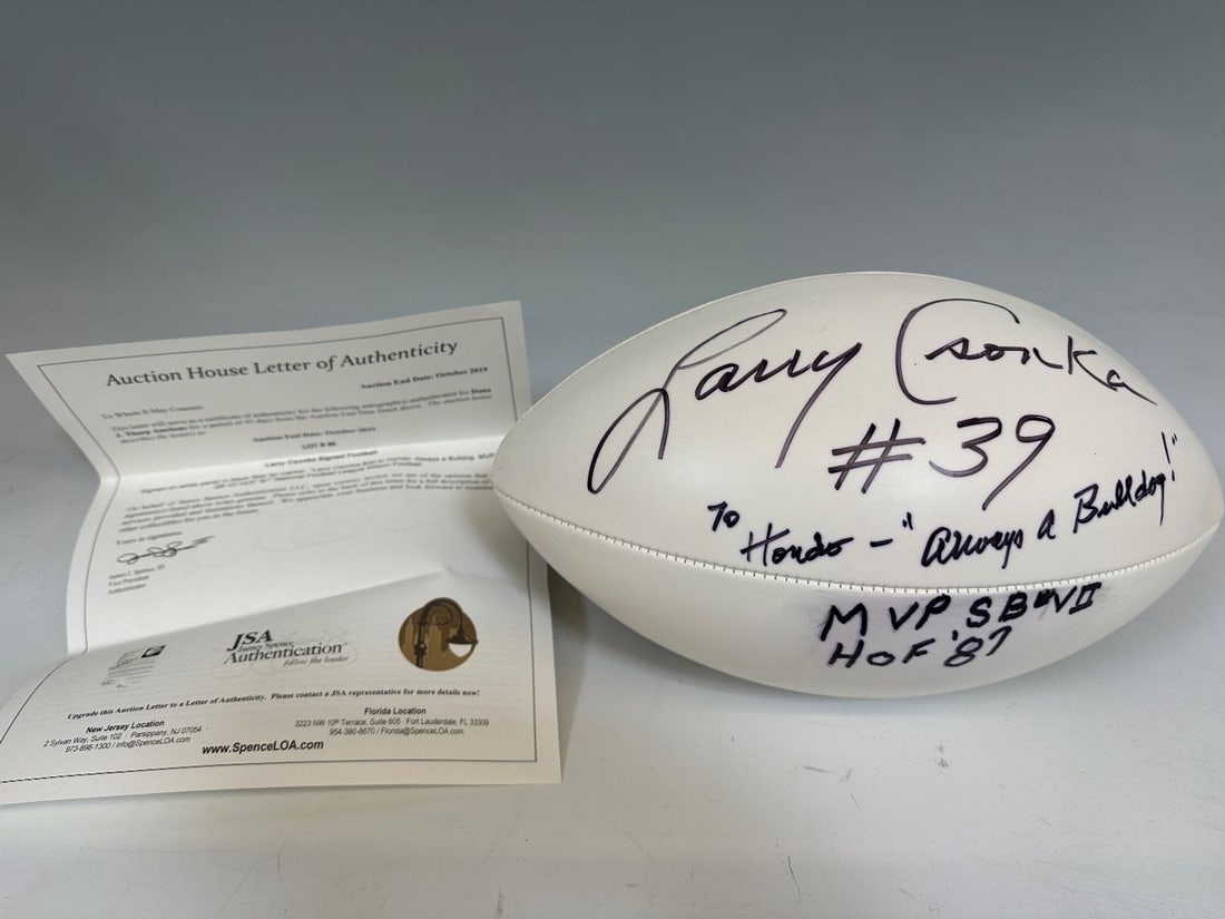 Larry Csonka Autographed Football JSA Auction House Letter: Larry Csonka Autographed Football JSA Auction House Letter: Personalized football comes with old COA JSA Auction House Letter.