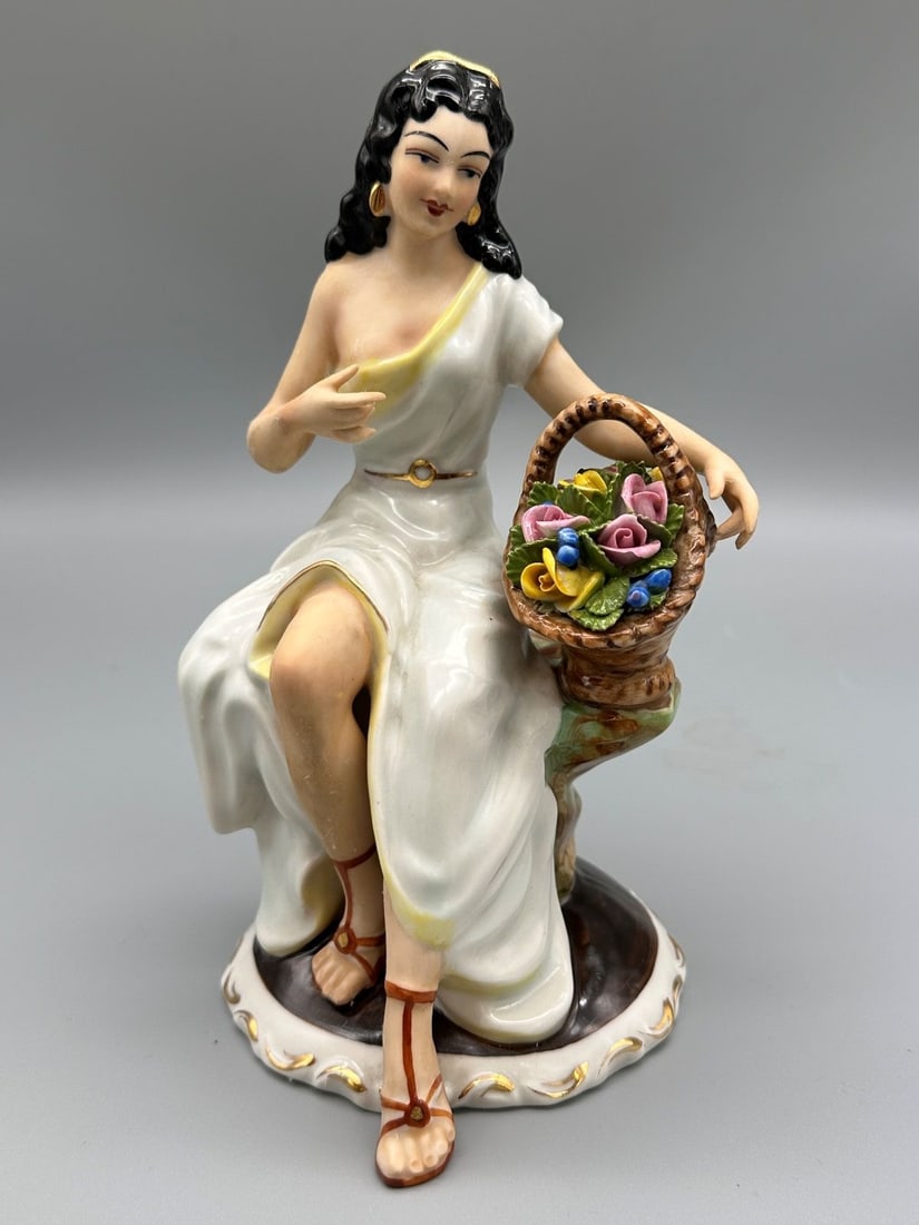 Dresden Sandizell Hoffner and Co. Figurine: Dresden Sandizell Hoffner and Co. Figurine: Lady with Flowers. Measures 7.5" tall.