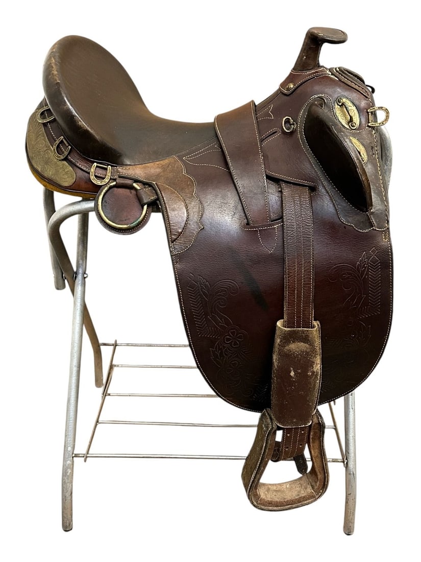 Western Saddle With Brass Fixtures: Western Saddle With Brass Fixtures: Extremely heavy work saddle. Measures 20" from Horn to Cantel.