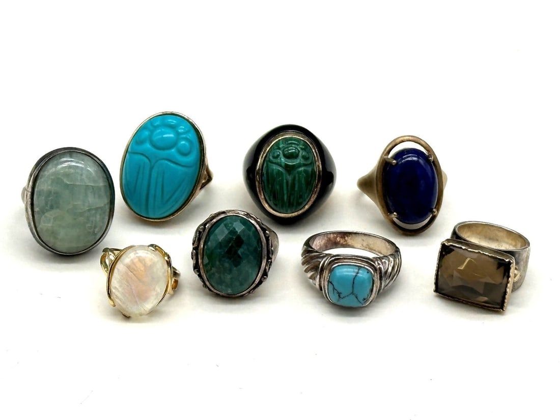(8) Sterling Silver Rings: (8) Sterling Silver Rings: Includes turquoise, malachite, Egyptian beetles. Sizes range from 5-9.25.