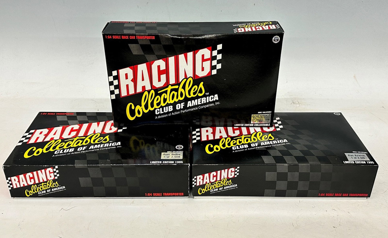 (3) Racing Collectibles Club of America Limited Edition Team Haulers: (3) Racing Collectibles Club of America Limited Edition Team Haulers. This group includes die cast replicas from Alan Kulwicki 1 of 2508, Brett Bodine 1 of 2508 and The Cartoon Network #29 Flinstones 