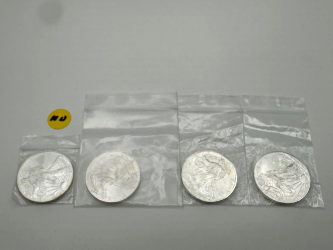 NN) (4) Silver American Eagles BU (1 of 2)