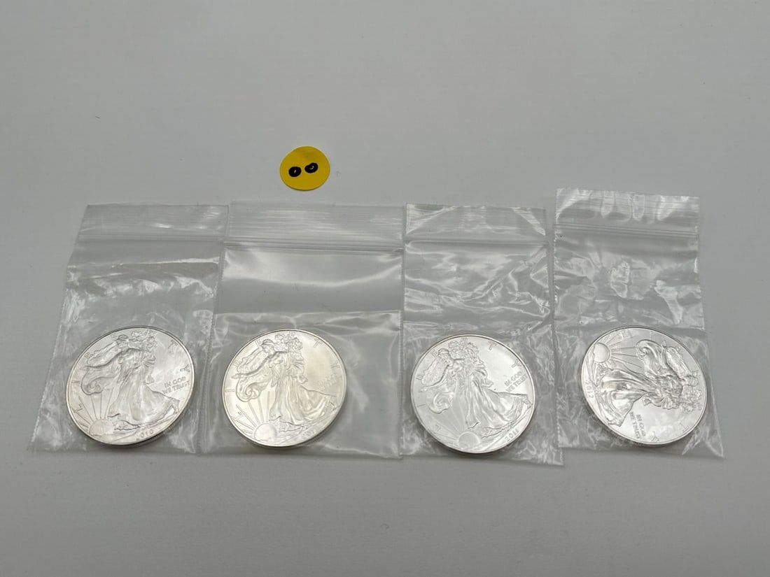 OO) (4) Silver American Eagles BU (1 of 2)