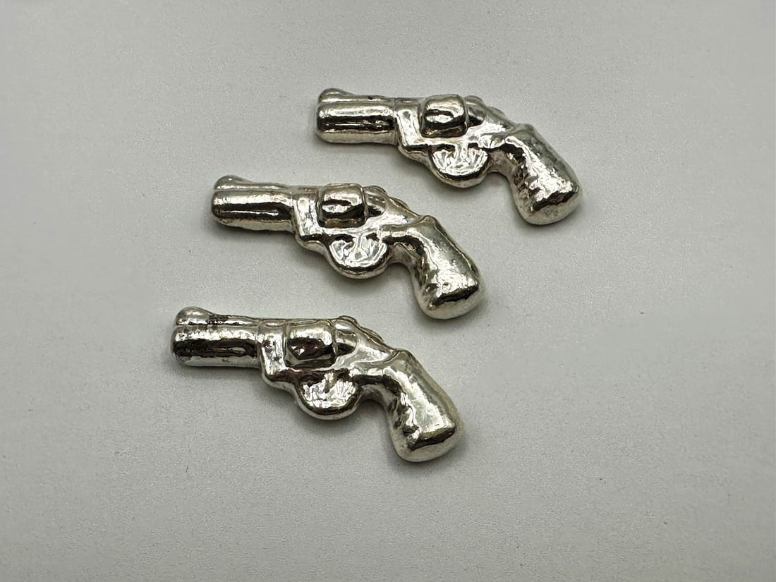 (3) MK Barz Poured Silver Revolver Guns (38) Total Grams .999 Fine: (3) MK Barz Poured Silver Revolver Guns (38) Total Grams .999 Fine.