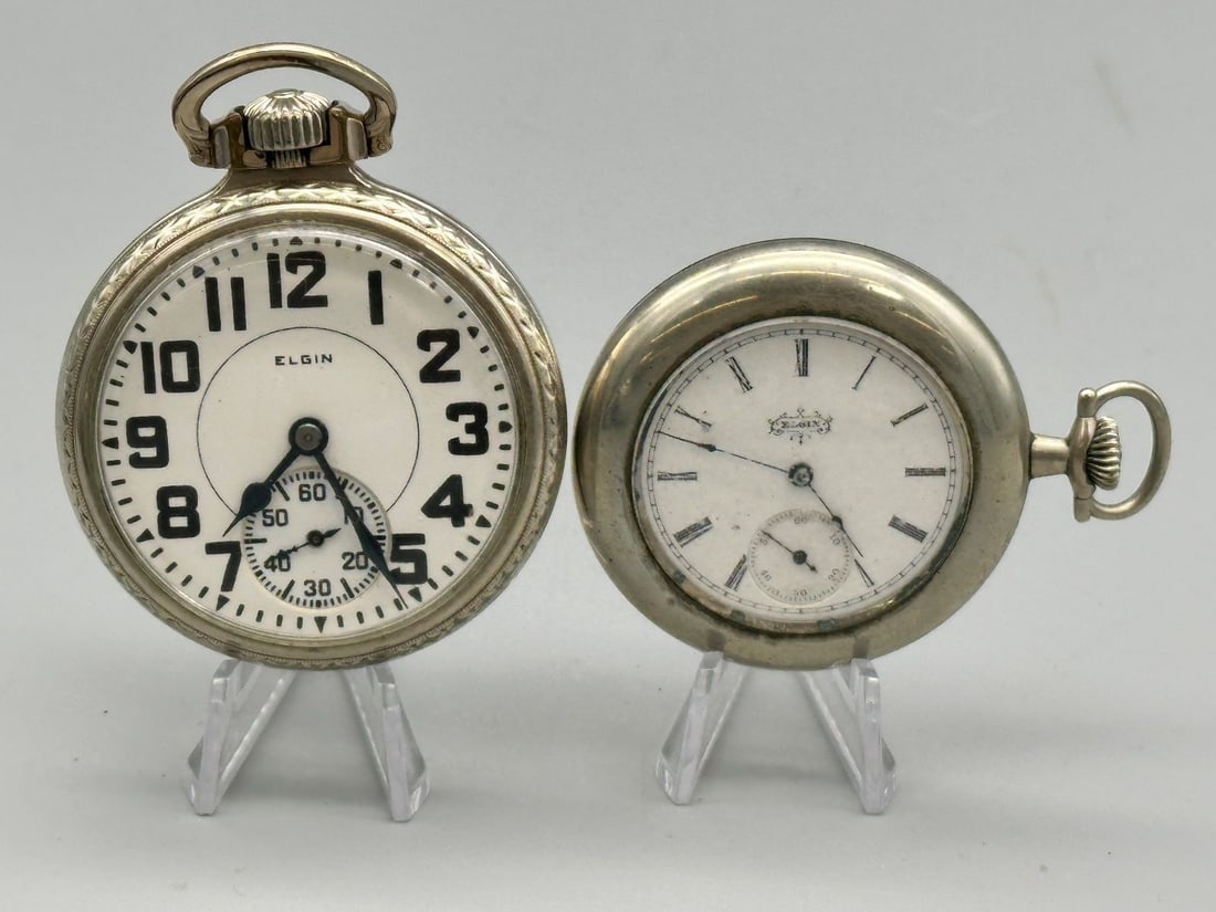 (2) Elgin Gold Filled and Nickeloid Pocket Watches: (2) Elgin Gold Filled and Nickeloid Pocket Watches: (1) 21 jewel, 14k gold filled, BW Raymond model, Keystone case, movement 31311029. (1) 1897 6s, 7 jewel, Nickeloid Keystone case, movement number 66