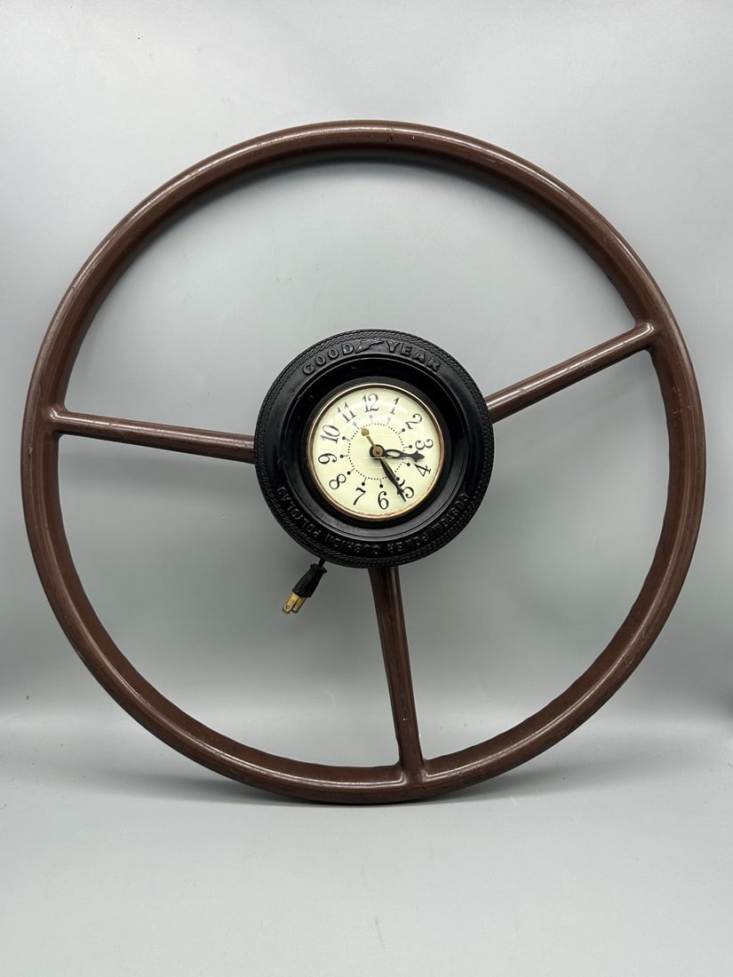 Early Art Deco Goodyear Ashtray Hand Crafted Clock in Early Vehicle Steering Wheel: Early Art Deco Goodyear Ashtray Hand Crafted Clock in Early Vehicle Steering Wheel: Incredible and unique hand crafted clock made from 1950's steering wheel, Goodyear rubber ashtray.
