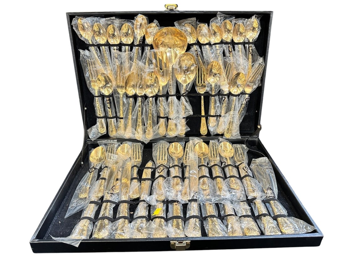 Gold Plated Stainless Flatware: Gold Plated Stainless Flatware: Made in China, all in unopened packages. Includes (12) knives, (10) soup spoons, (12) dinner forks, (12) tea spoons, large serving spoon, large serving fork, scalloped 