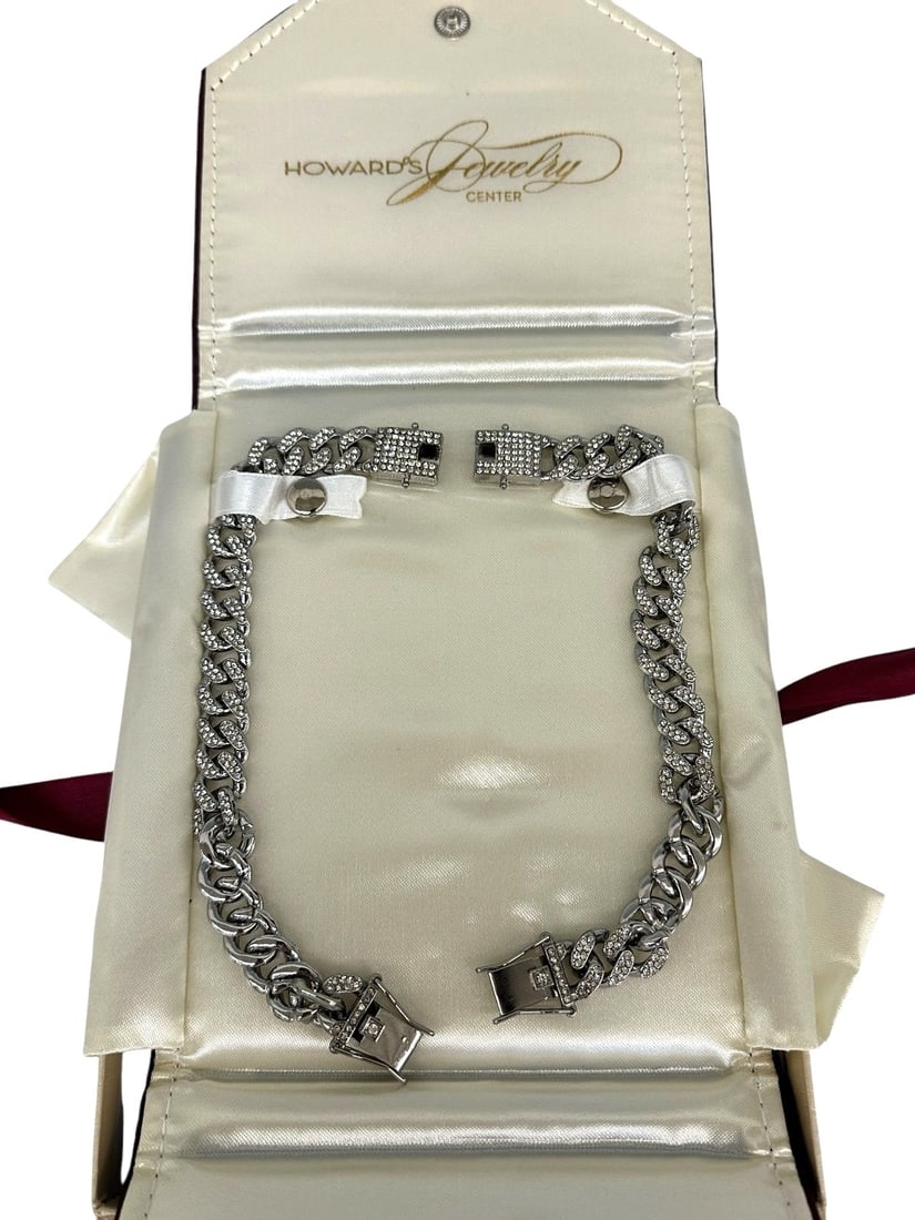 Pair of Costume Heavy Link Men's Bracelets: Pair of Costume Heavy Link Men's Bracelets: Measuring 8" each, comes in Howard's Jewelry Center.