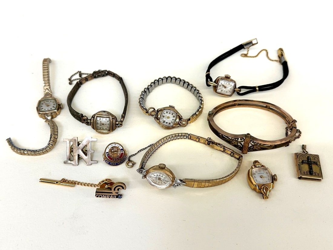 Group of Gold Filled Jewelry: Group of Gold Filled Jewelry: Includes watches, pins, locket, and bracelet.