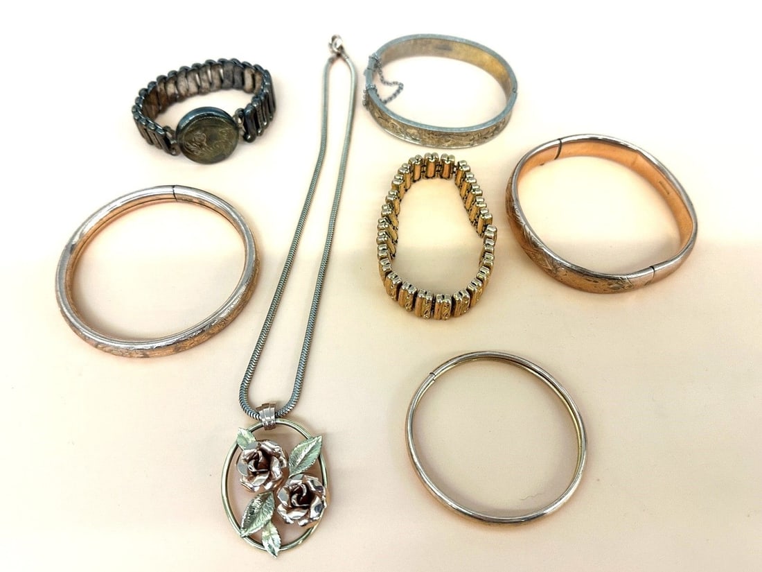 Group of Gold Filled Jewelry: Group of Gold Filled Jewelry: Includes (6) bracelets and Krementz necklace.