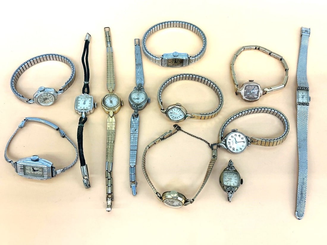 (12) Group of Gold Filled Ladies Watches: (12) Group of Gold Filled Ladies Watches: Includes Elgin, Lucerne, Bulova, Omega, Timex, Gruen, Hamilton, Barrington, Central, Waltham.