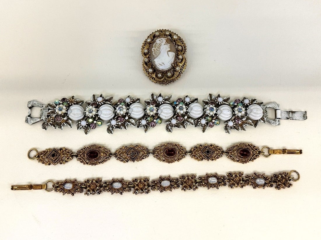 Group of Fiorenza Costume Jewelry: Group of Fiorenza Costume Jewelry: Includes 3 bracelets, and 1 cameo brooch.