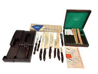 Group of Cutco Cutlery With Sleeves and Hangers