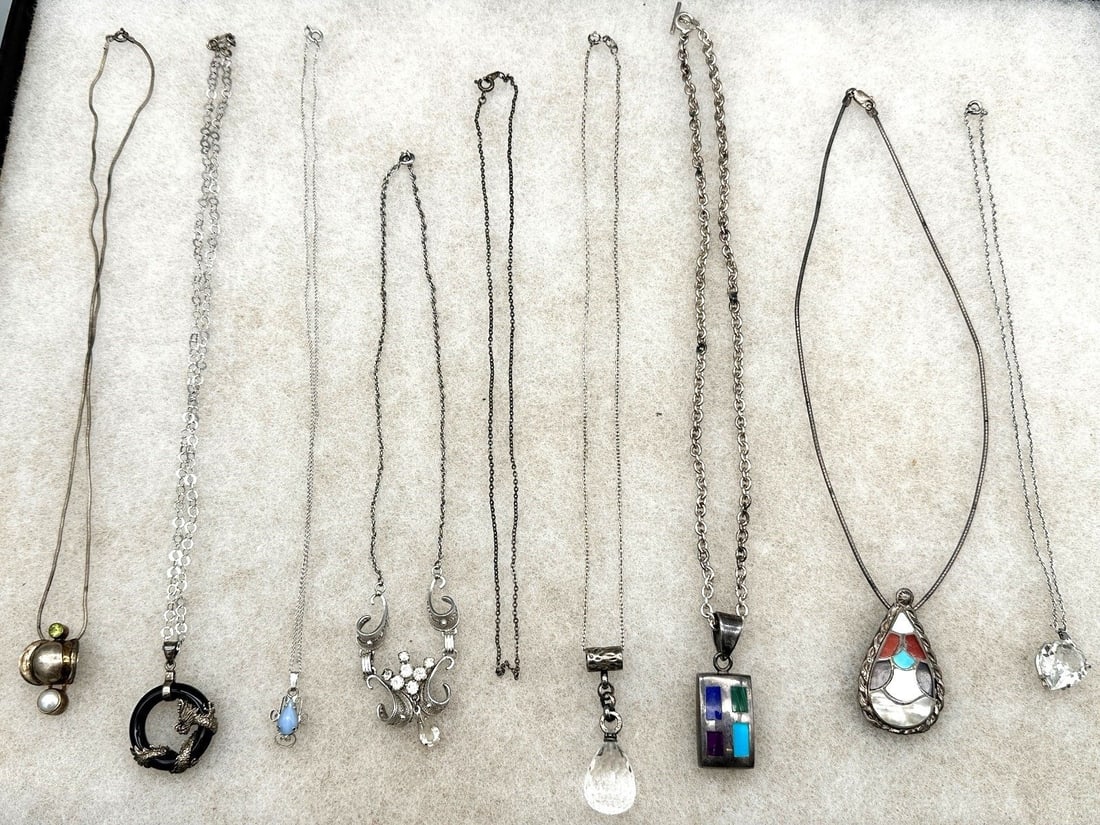 (9) Sterling Silver Necklaces With Pendants: (9) Sterling Silver Necklaces With Pendants: (8) have pendants, includes dragon, drop crystal, Native American, artisan.