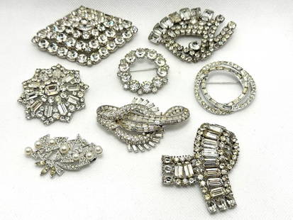 (8) Group of Early Vintage Clear Rhinestone Jewelry Brooches: Group of Early Vintage Clear Rhinestone Jewelry Brooches: Includes Ribbon, Pell, Pennino, Jay Flex Sterling. Largest is 3.5" long.