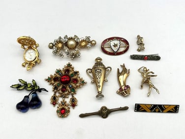 (12) Group of Costume Brooches; Hattie Carnegie, Others