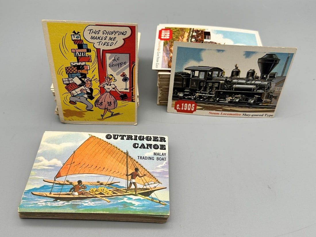1957 Topps Goofy Series Postcard Set, 1955 Sails & Rails Cards: 1957 Topps Goofy Series Postcard Set, 1955 Sails & Rails Cards: Goofy series complete set 1-60. Sails and Rails include 1-57, 60-73, 75, 77-80, 131-150.