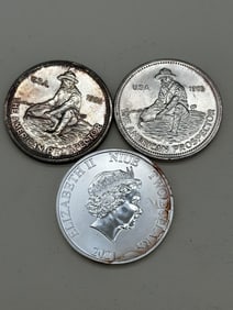 (2) 1985 The American Prospector .999 Silver Rounds, (1) 2021 NIUE Millenium Falcon $2 Dollar Silver