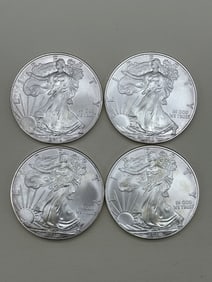 (4) 2010 American Silver Eagles: