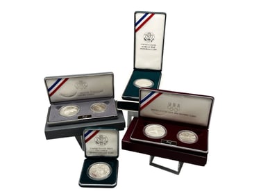 (4) Commemorative Silver Dollars