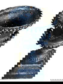 Cast Iron Black Painted Urn Yard Sculpture Co-Operative Foundry Co. Rochester, NY.: Cast Iron Black Painted Urn Yard Sculpture Co-Operative Foundry Co. Rochester, NY.: Cast iron piece with floral swags and loop handles set on square plinth. Measures 30" tall, 17.25" in diameter. This