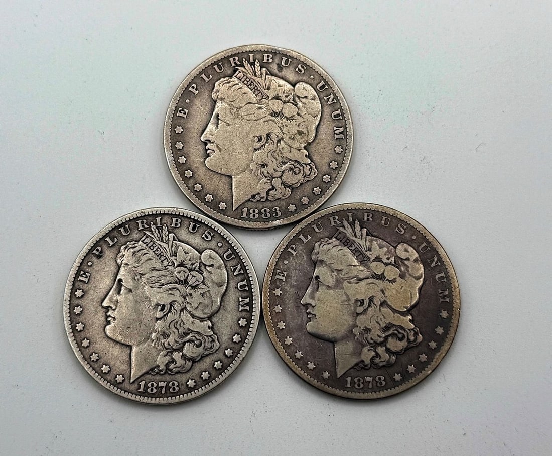 (3) Carson City Morgan Dollars, (2) 1878-CC (1) 1883-CC: (3) Carson City Morgan Silver Dollars, (2) 1878-CC (1) 1883-CC.