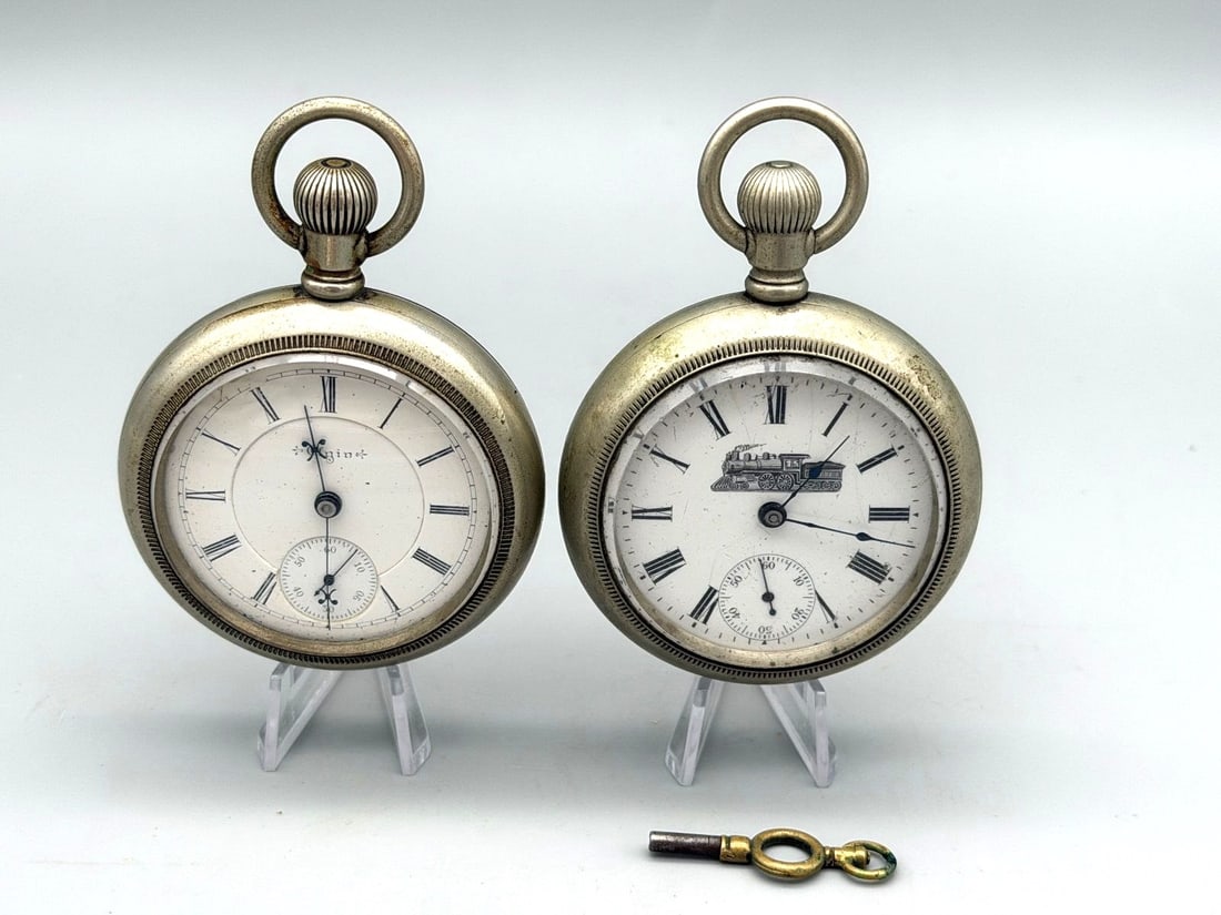 (2) Silver Tone Pocket Watches: Elgin & New Era: (2) Silver Tone Pocket Watches: Elgin & New Era: 1897 Elgin Silverode 17 jewel pocket watch, and New Era USA silverode.