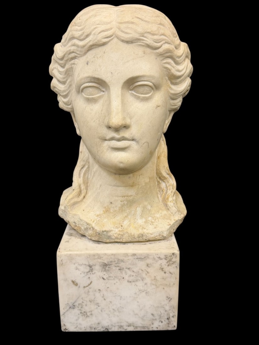 Roman Marble Head of a Woman on Marble Plinth: Roman Marble Head of a Woman on Marble Plinth: Measuring 14.75" tall, base measures 5.5" square. Extremely heavy piece. Unknown signature on back.