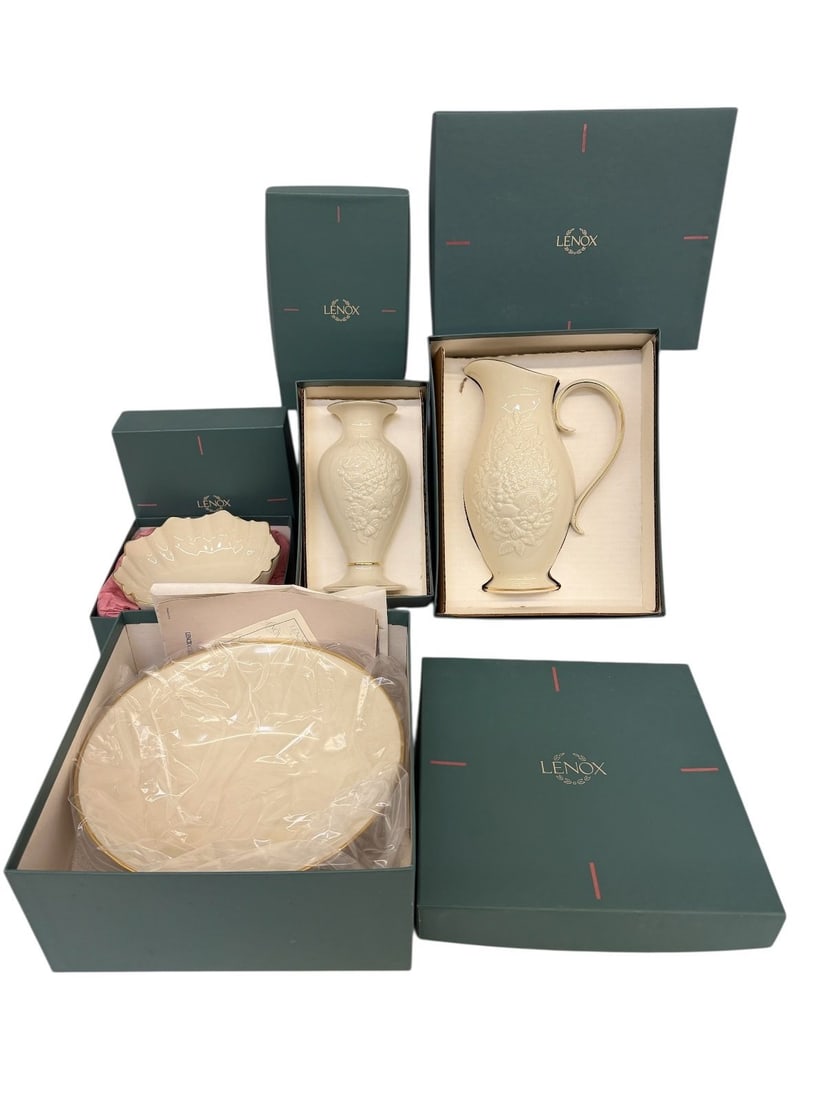 (4) Pieces of Lenox China In Original Boxes: (4) Pieces of Lenox China In Original Boxes: Includes Fruits of Life Bowl, pitcher and vase. Symphony sculptured bowl.