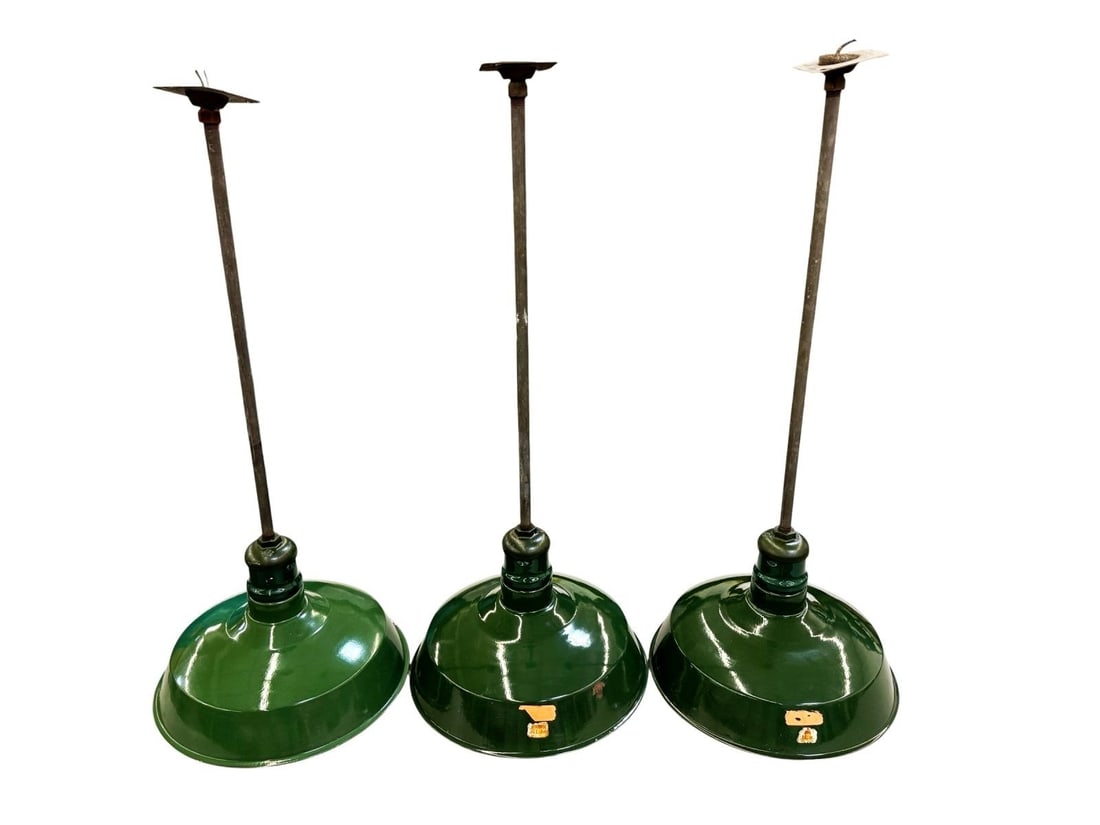 (3) Vintage Green Enamel Westinghouse Pendants and Sconces: (3) Vintage Green Enamel Westinghouse Pendants and Sconces are from the 1920's. Their diameter measures 18 inches and total length is 41.5 inches. See photos for condition.